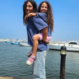 Model and kids wearing oversized blue washed T-shirts – PoshFashion kids fashion