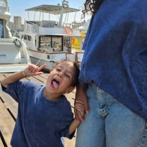 Model and kids wearing oversized blue washed T-shirts – PoshFashion kids fashion