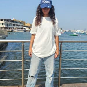 Model wearing regular fit plain white T-shirt – PoshFashion kids & adults matching collection