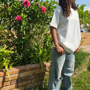 Model wearing regular fit plain white T-shirt – PoshFashion kids & adults matching collection