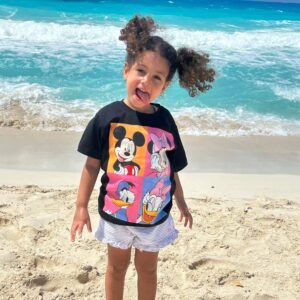 Model wearing a Mickey Mouse pop art squares – PoshFashion cartoon collection